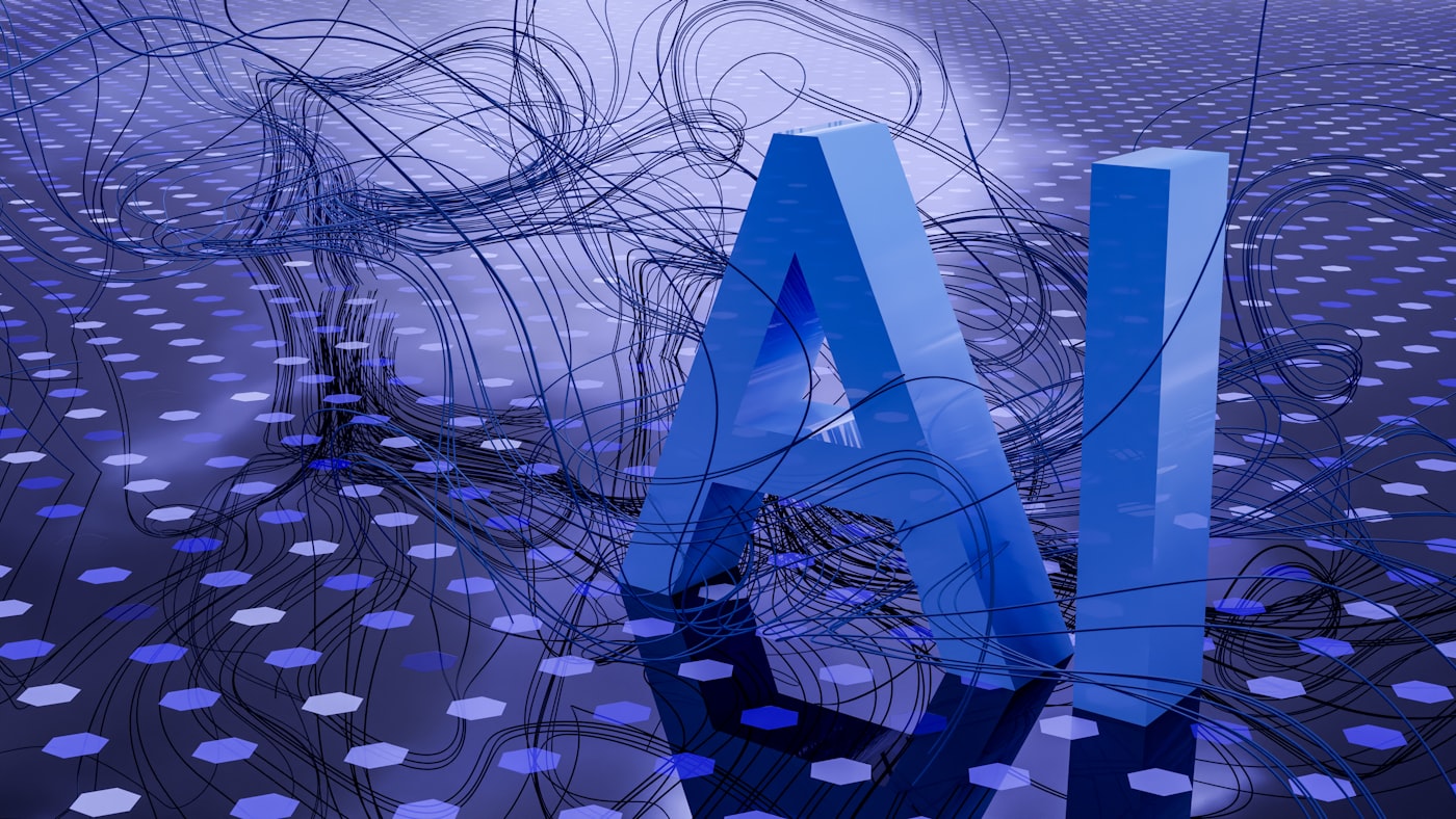 Escultura tridimensional con las letras IA rodeada de cables